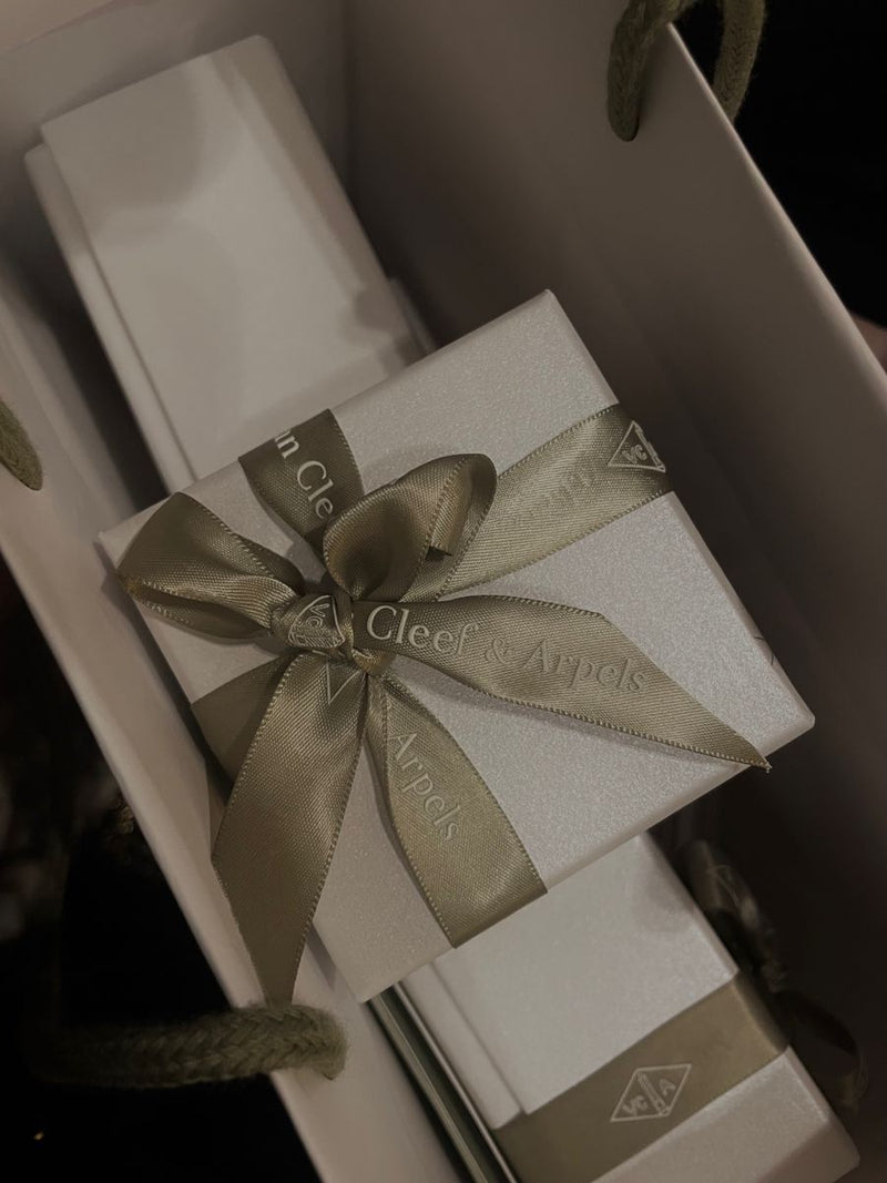 Van Cleef & Arpels or $10k